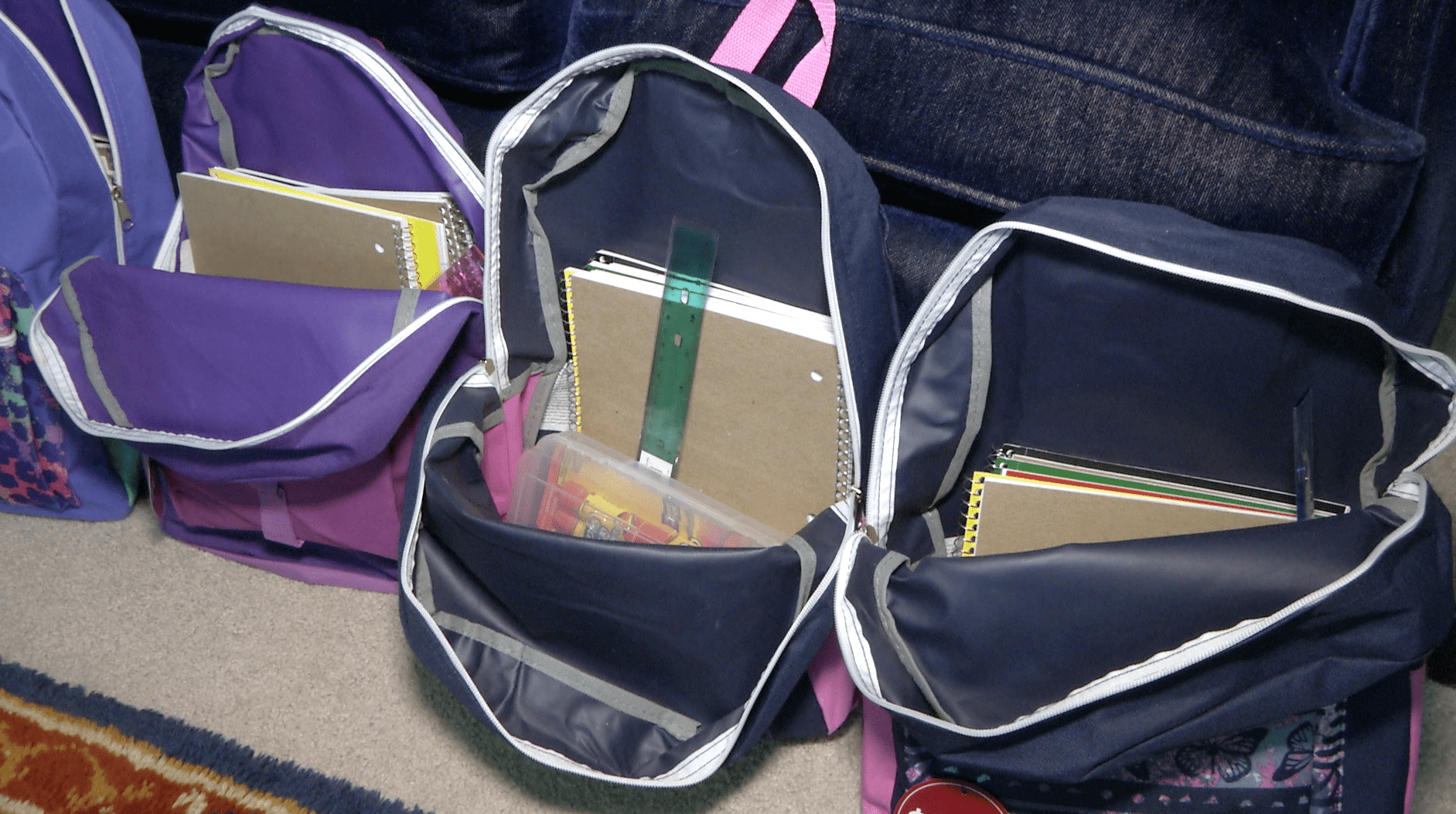 Resident Fills Backpacks to Help Kids Get Ready for School HOMTV